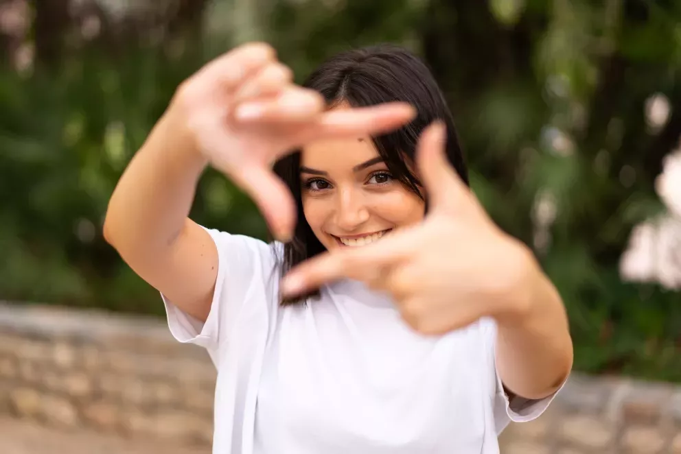 woman framing face woman framing face