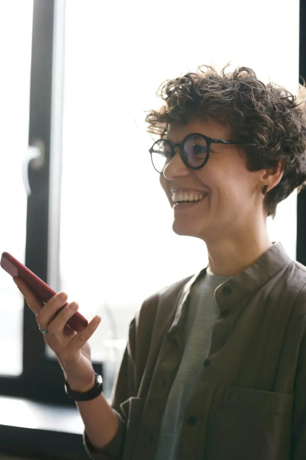 smiling business person talking on cell phone