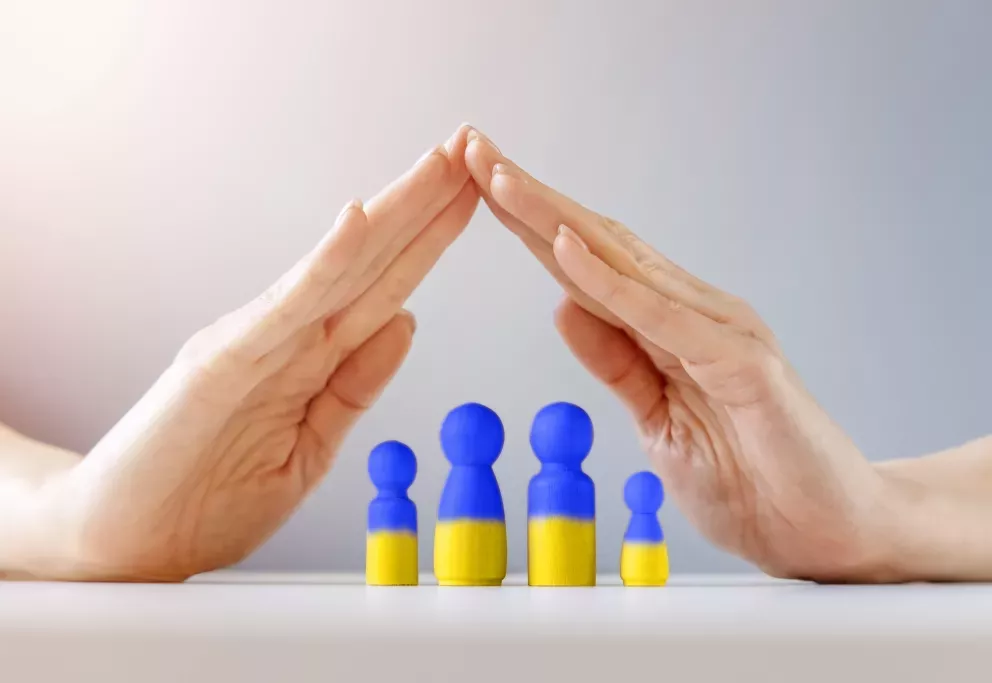 Hands protecting people