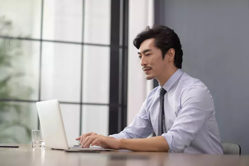 Businessman on laptop Businessman on laptop