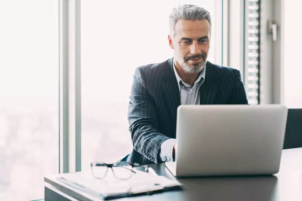 Businessman on laptop Businessman on laptop