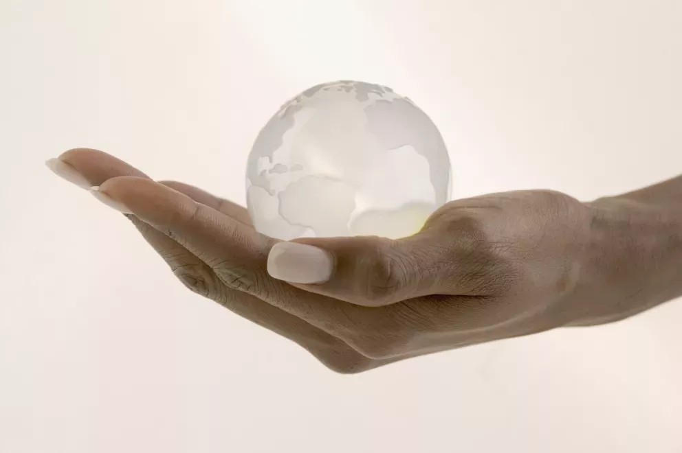 Hand with world