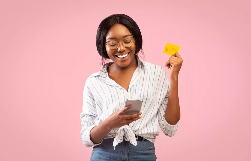 Woman with phone and card Woman with phone and card