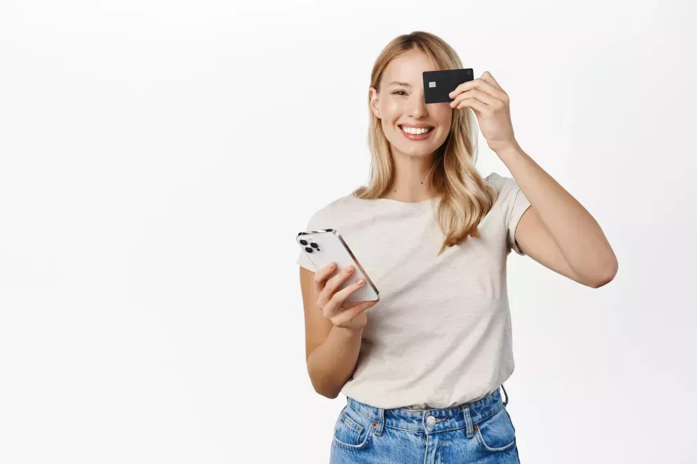 Woman with phone and card Woman with phone and card