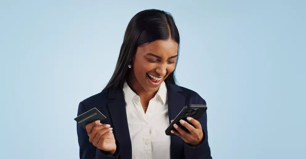 Woman with phone and card