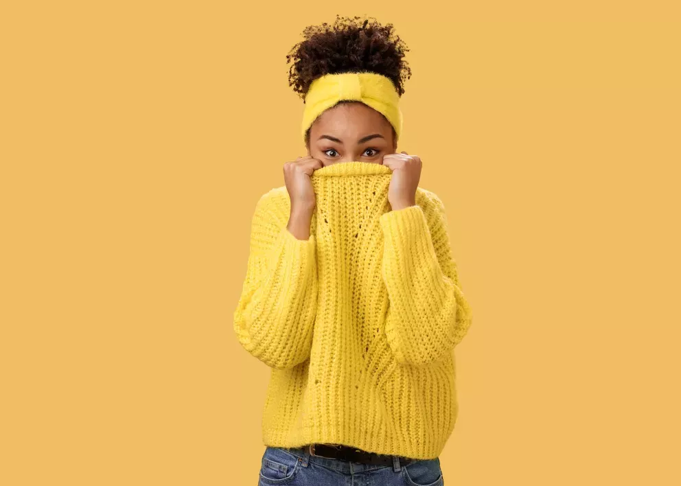 Woman hiding face
