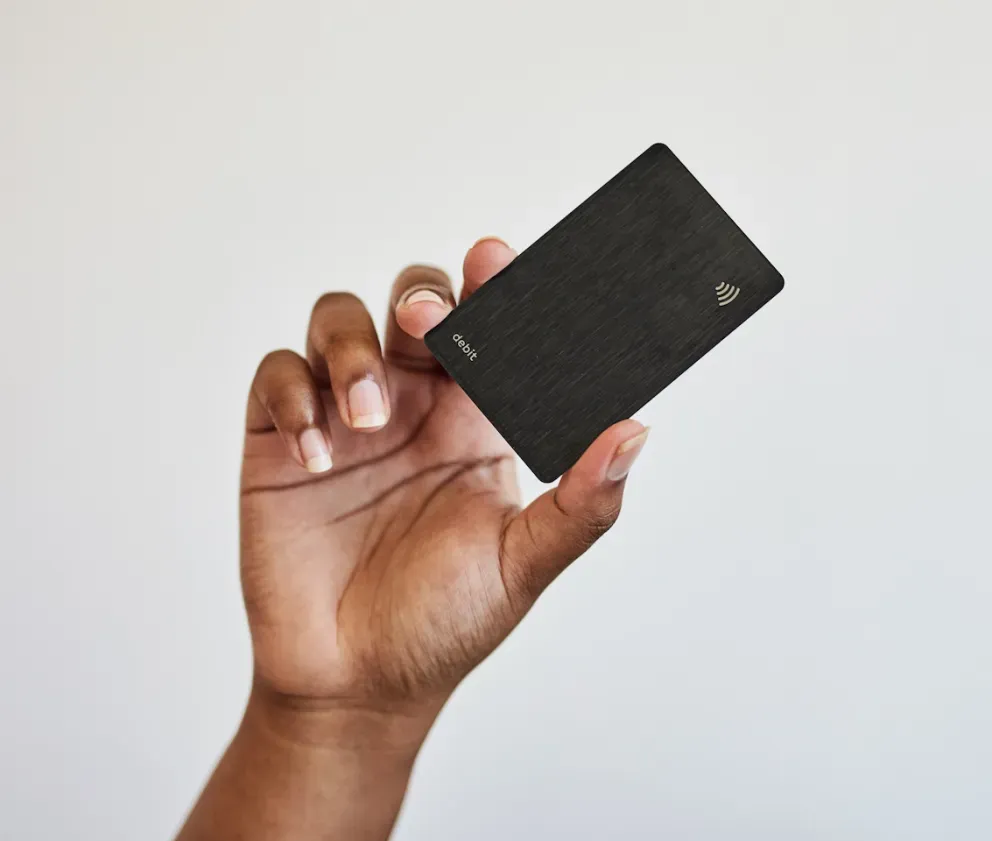 Hand with card