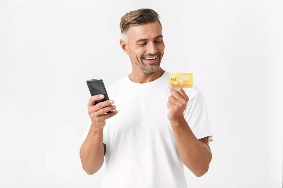 Man with phone and card