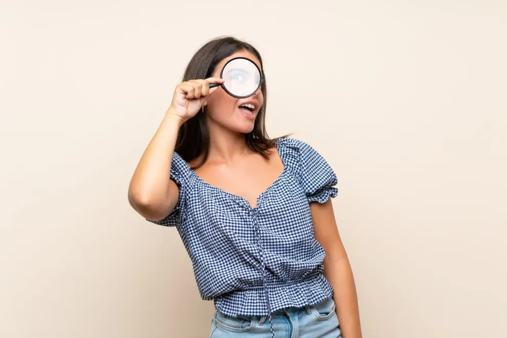 Woman with magnifying glass Woman with magnifying glass