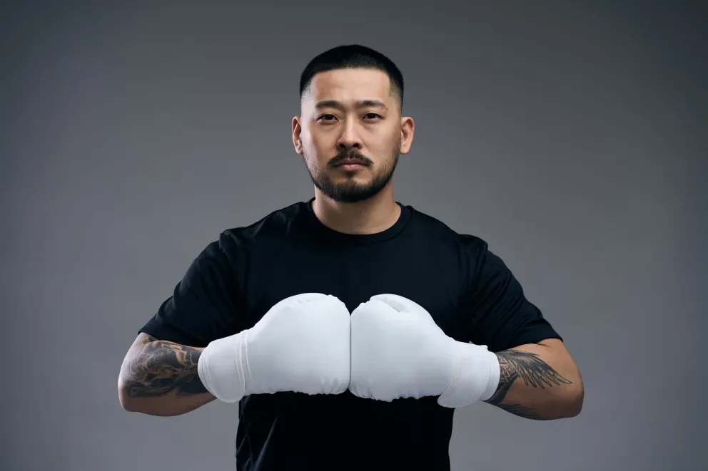 Asian man with boxing gloves