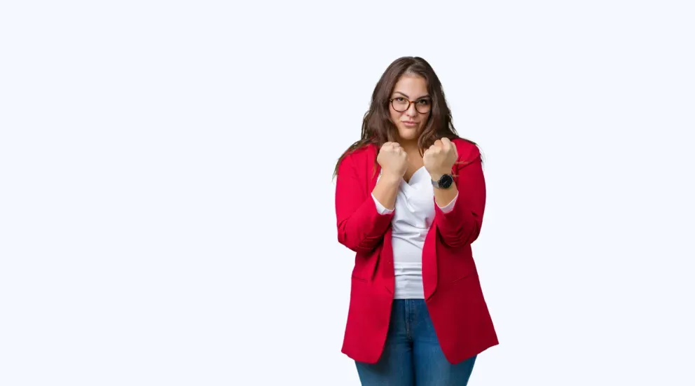 Business woman with fighting stance Business woman with fighting stance
