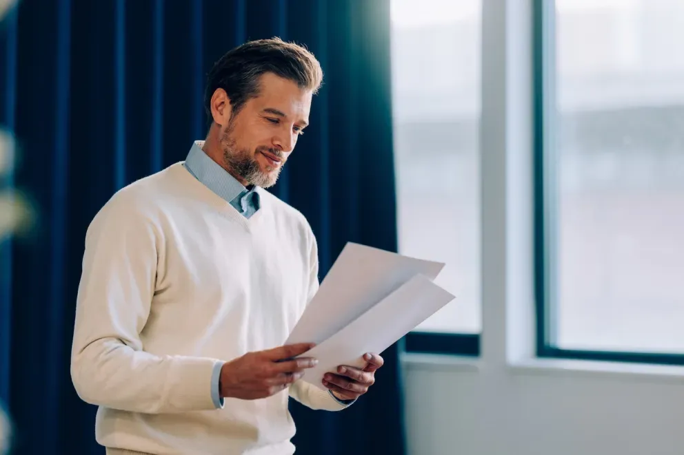 business man looking at paperwork