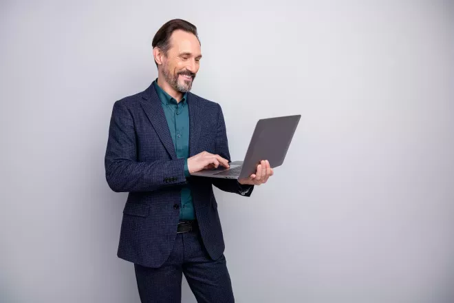 Man holding laptop