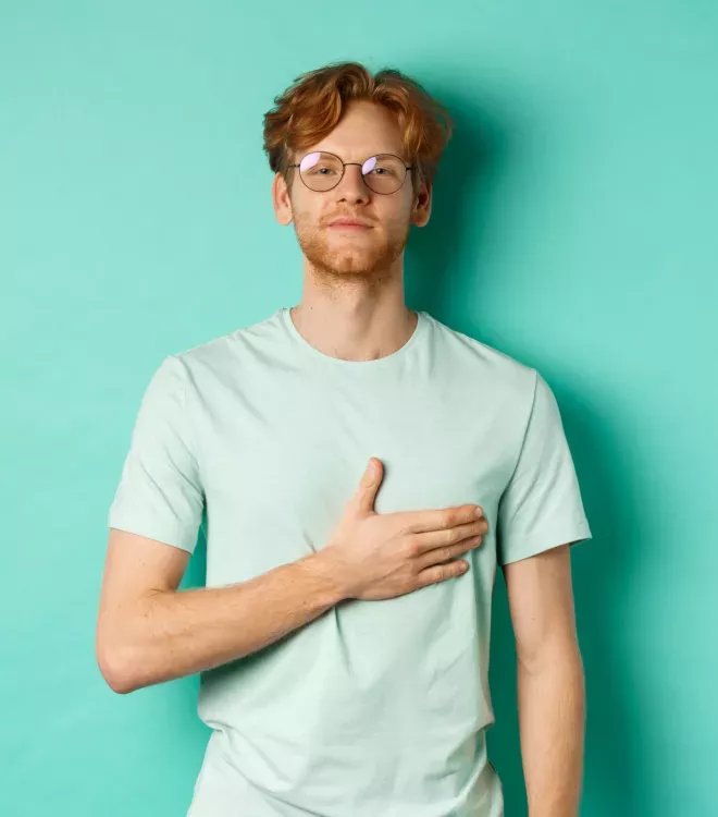 Man with his hand over his heart