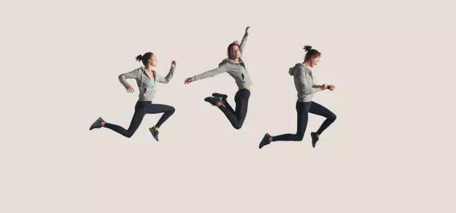 Action shot of woman running and jumping