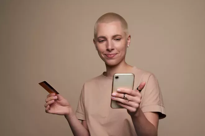Person banking on mobile phone
