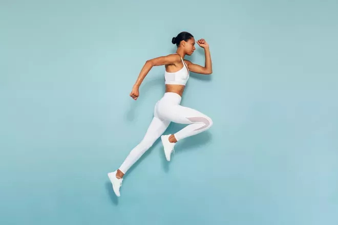 Woman running and jumping