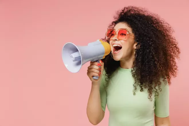 woman holding megaphone