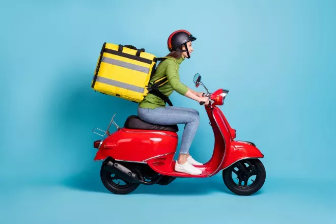 Person on scooter delivery