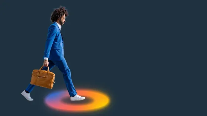 business person stepping into FICO O logo