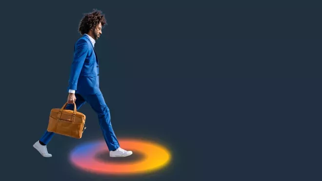 business person stepping into FICO O logo
