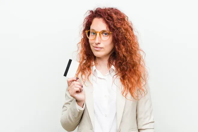 Woman holding credit card