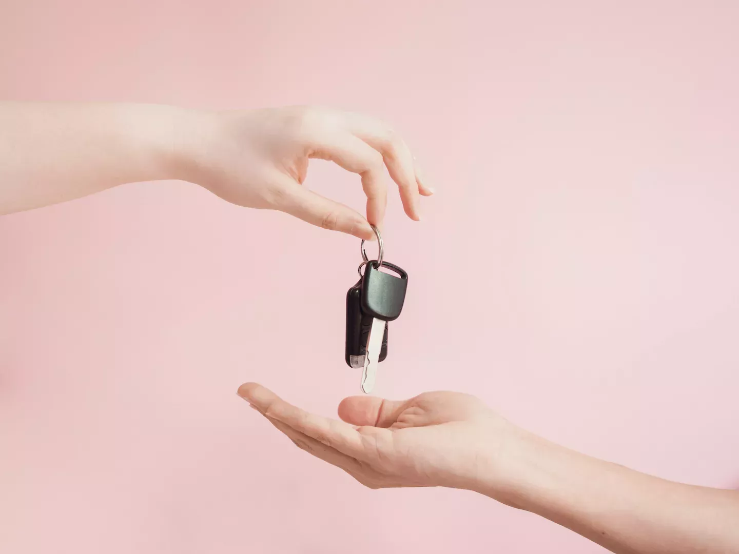 Hands holding keys