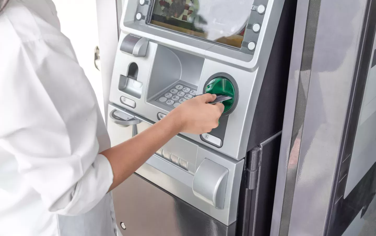 Woman using an atm machine