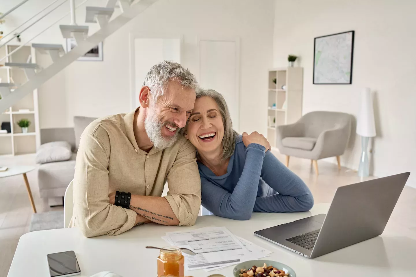 Couple paying their mortgage