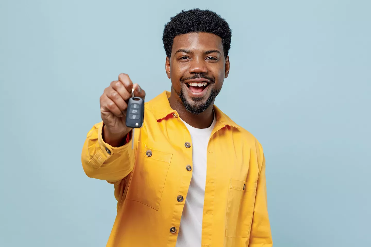 Man holding a set of car keys
