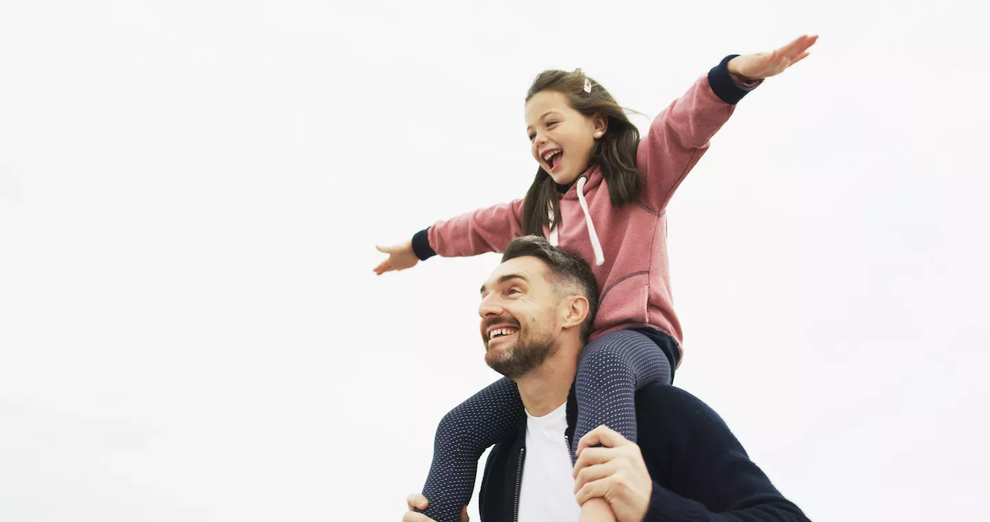 child on shoulders