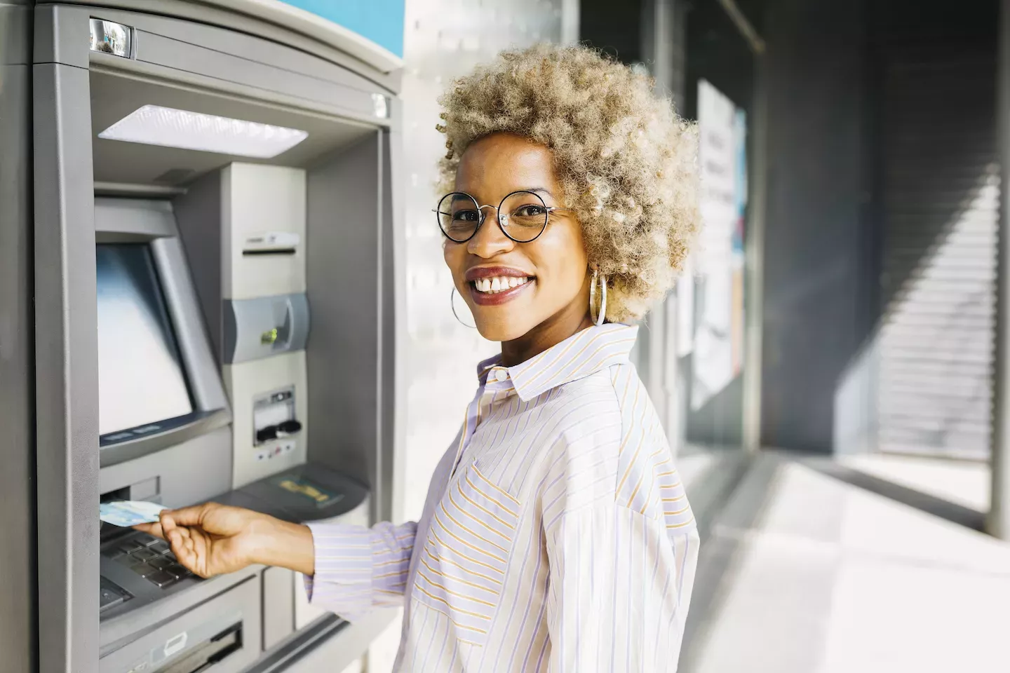 Woman using an atm machine