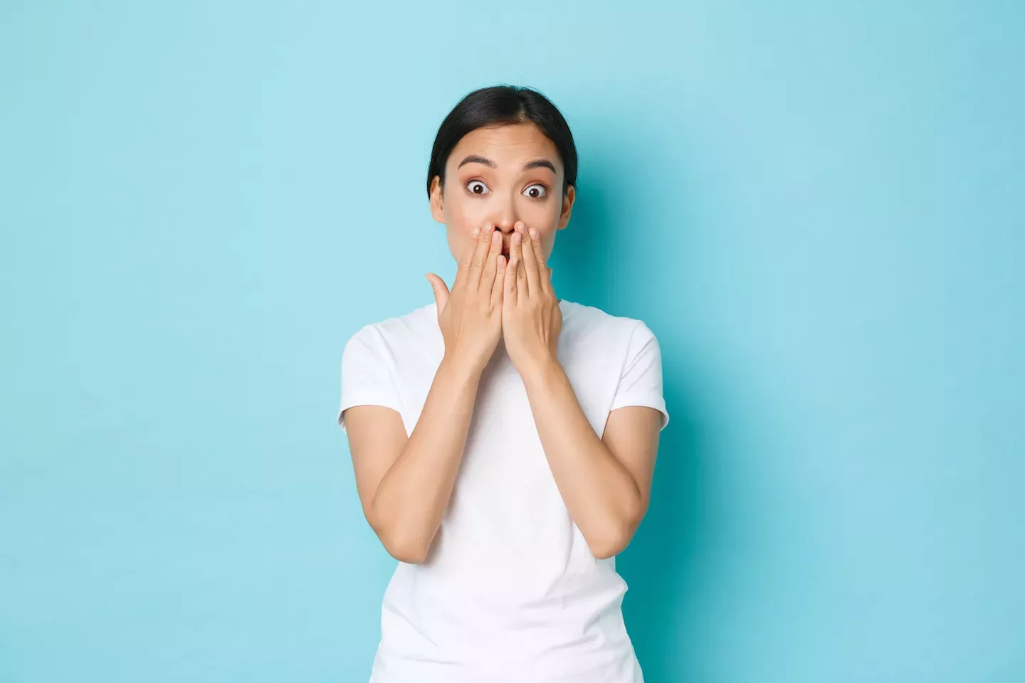 covering face with hands