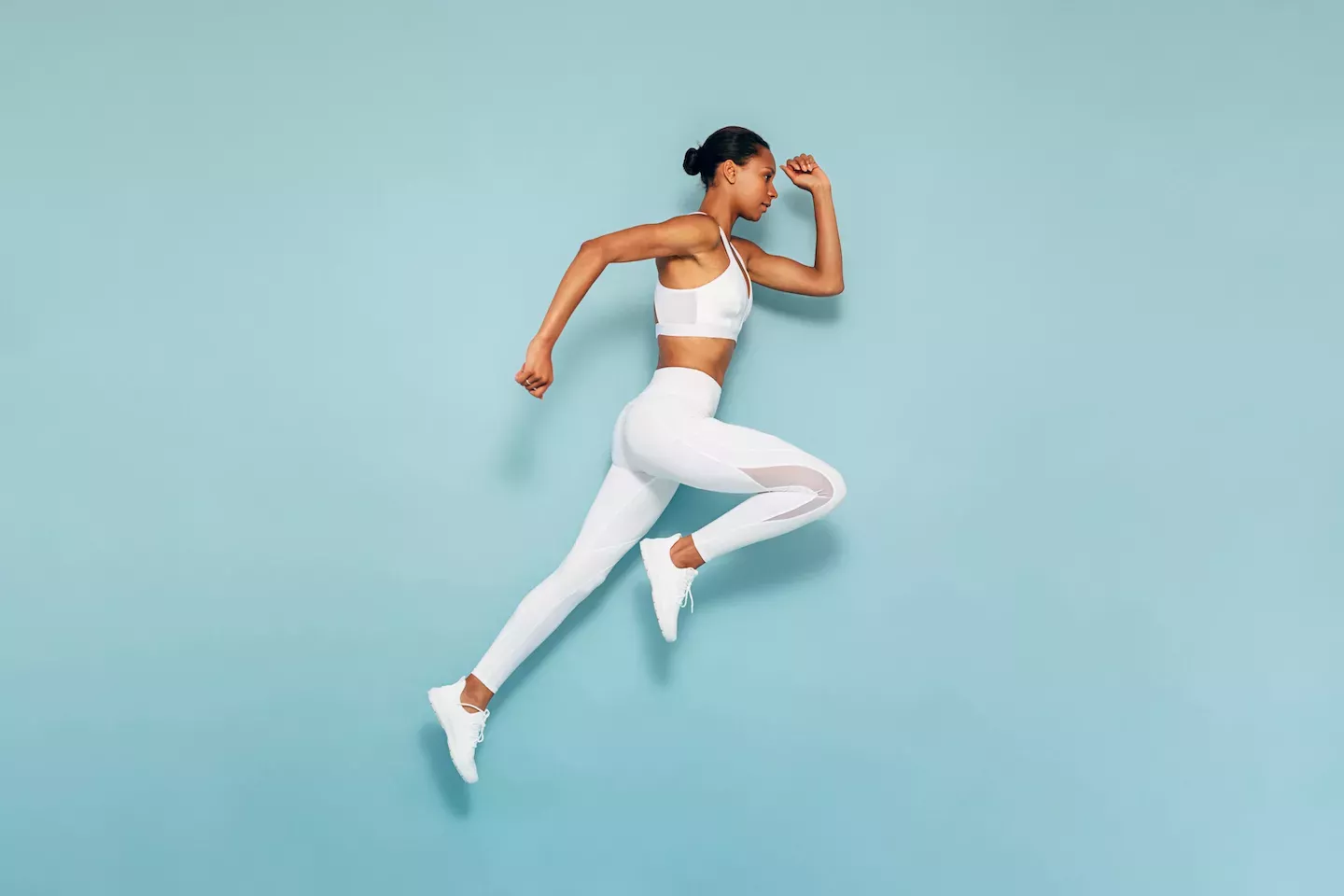 Woman running and jumping Woman running and jumping