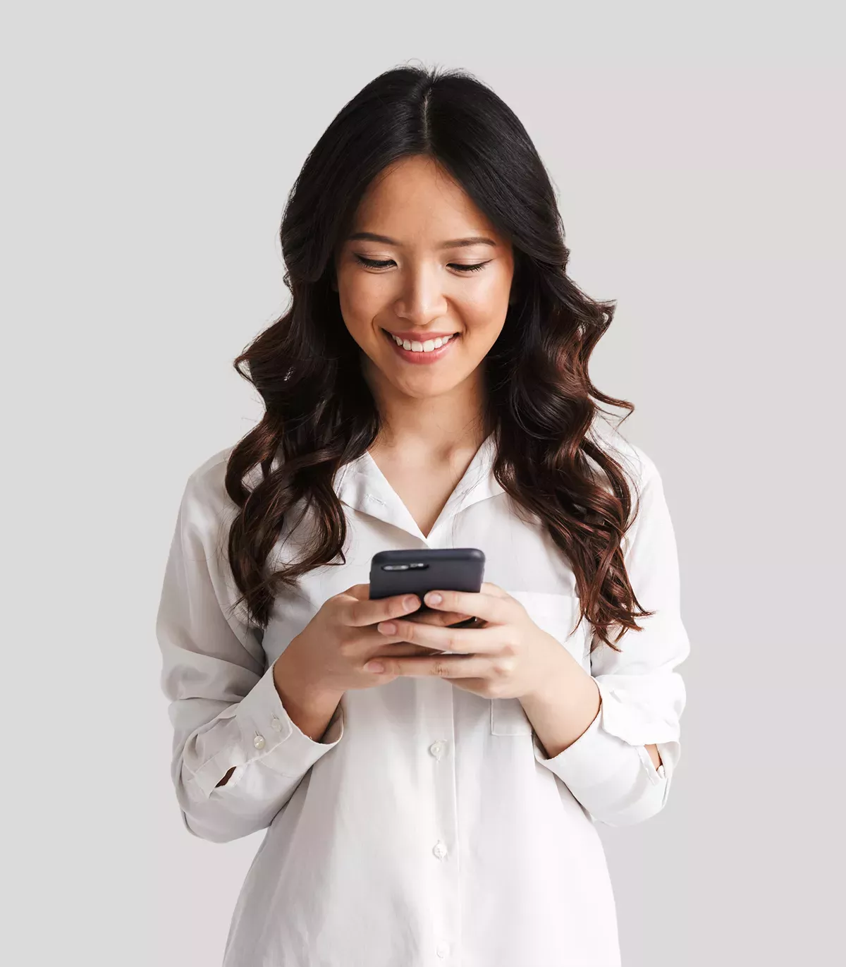 woman looking at phone