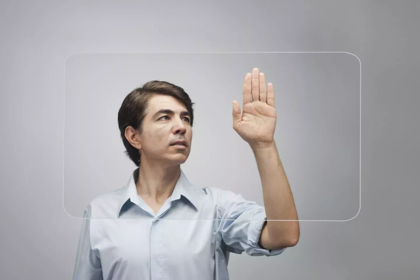 Man with hand up