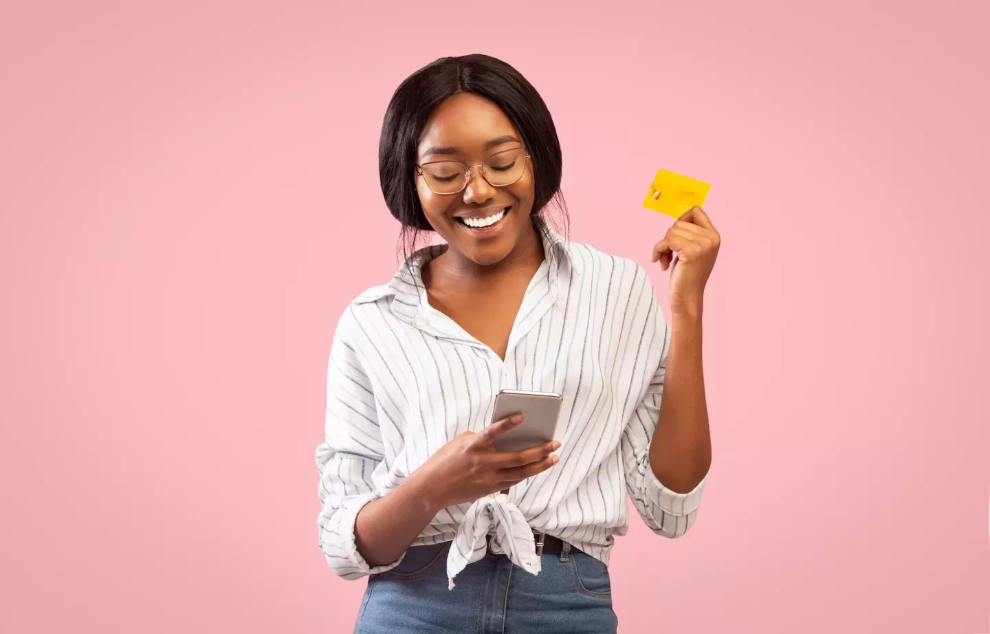 Woman with phone and card