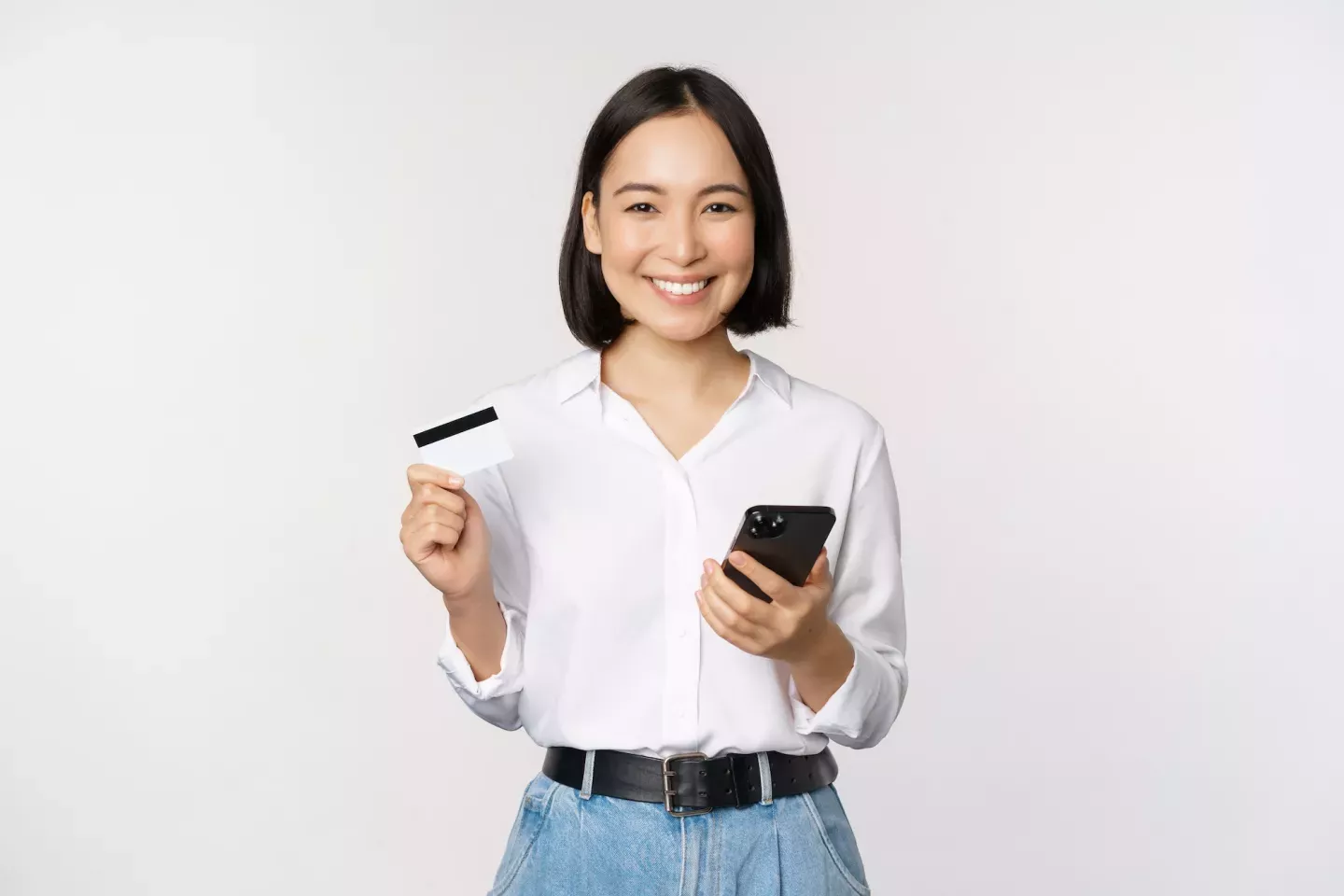 Woman with phone and card