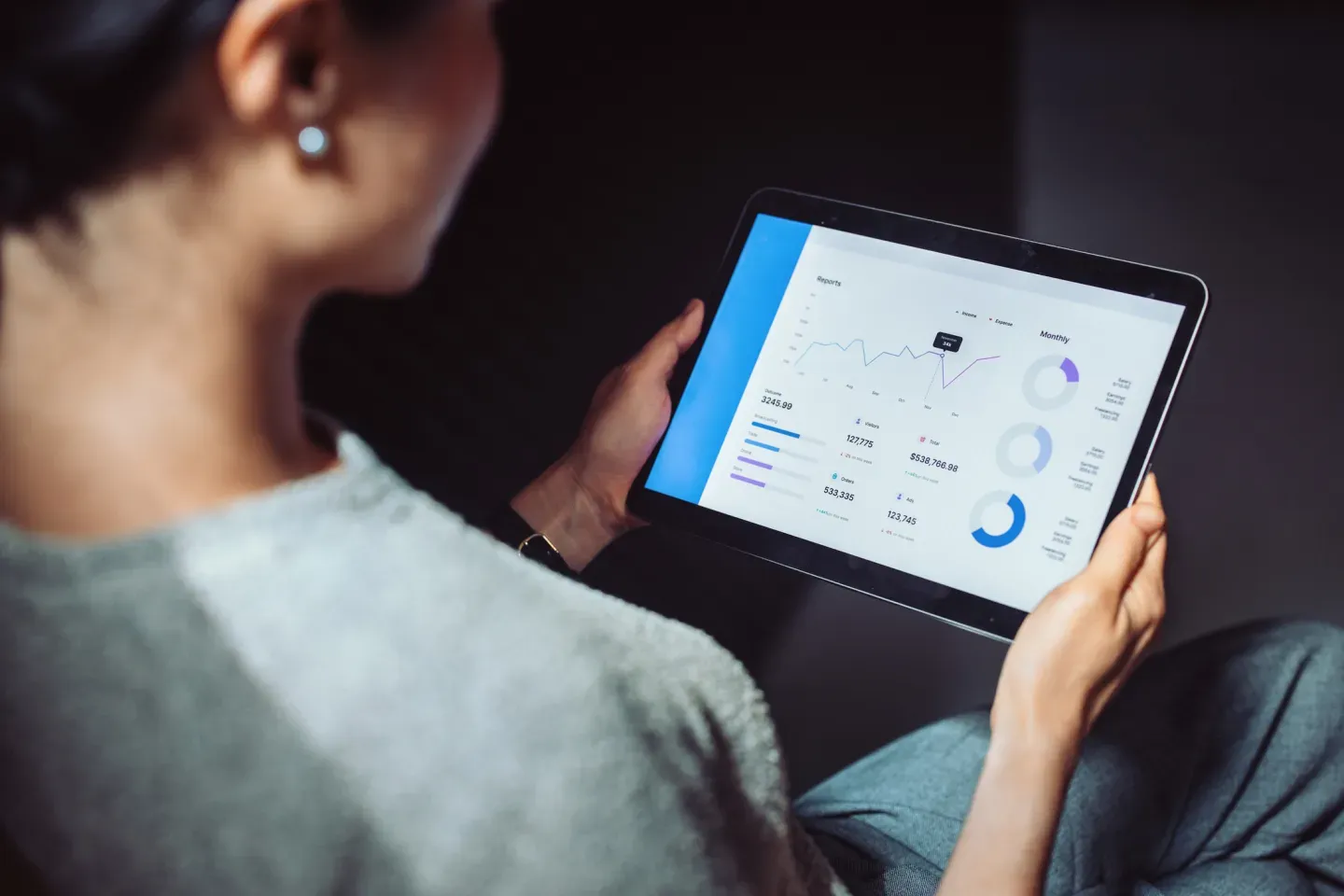 Woman using tablet with program