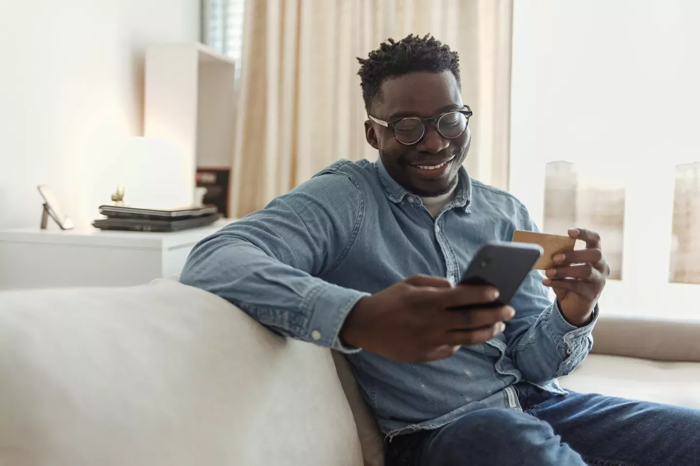 Man banking on mobile phone