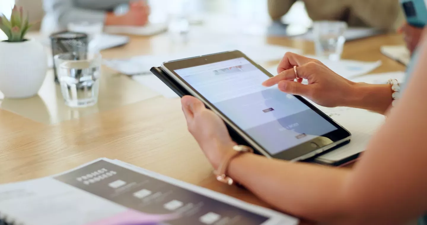 close up of person working on tablet 
