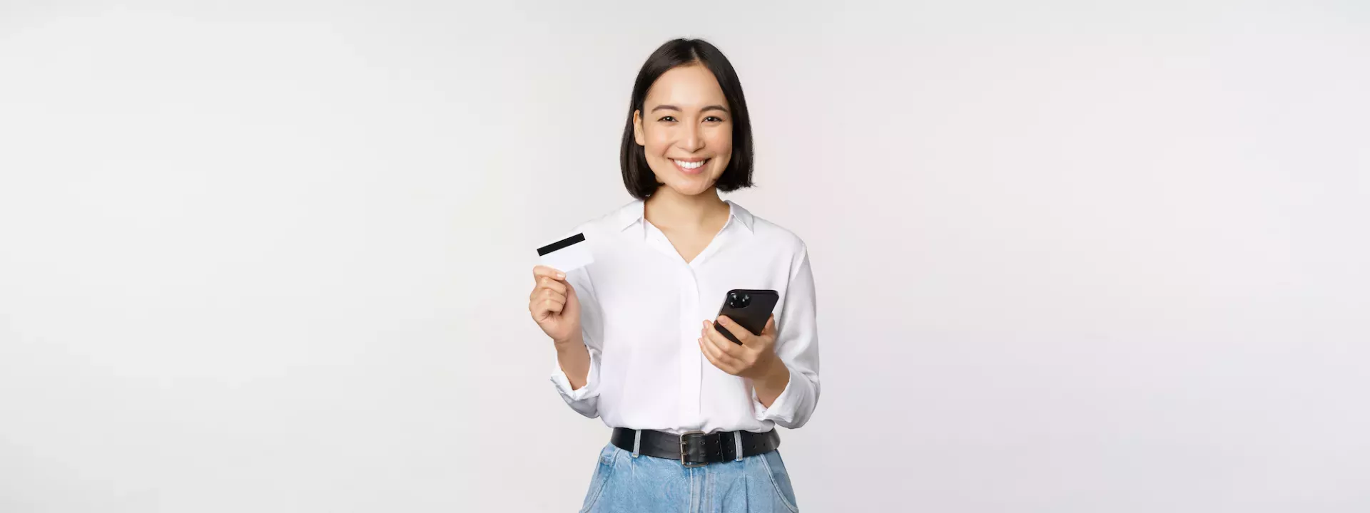 Woman with phone and card