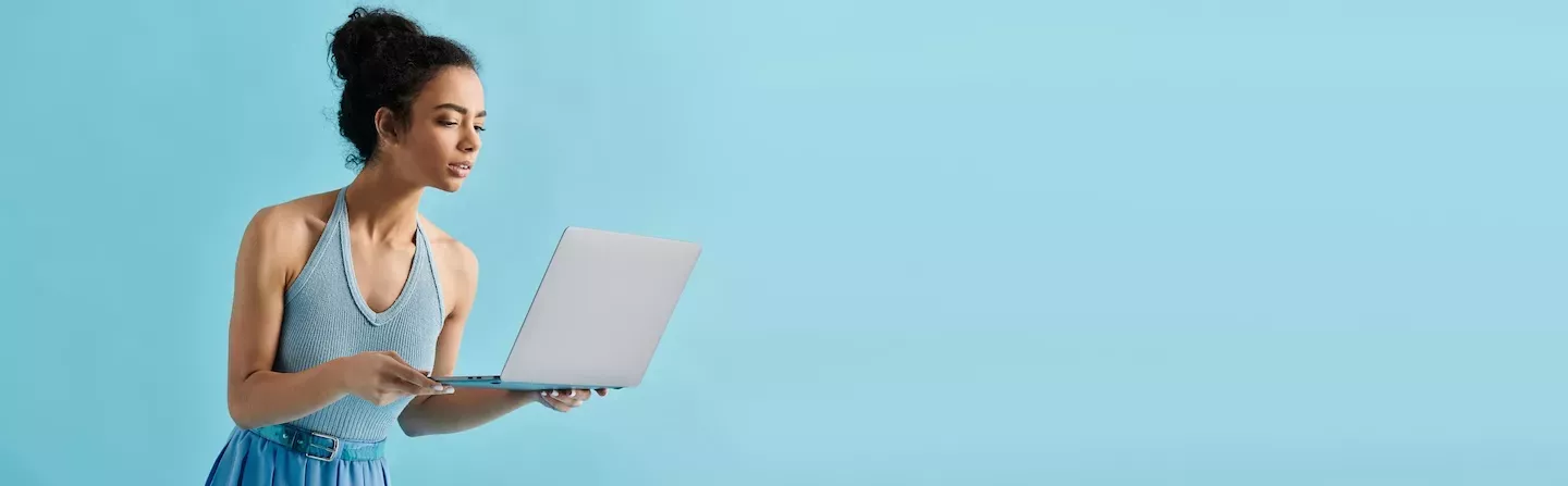 person looking at laptop computer