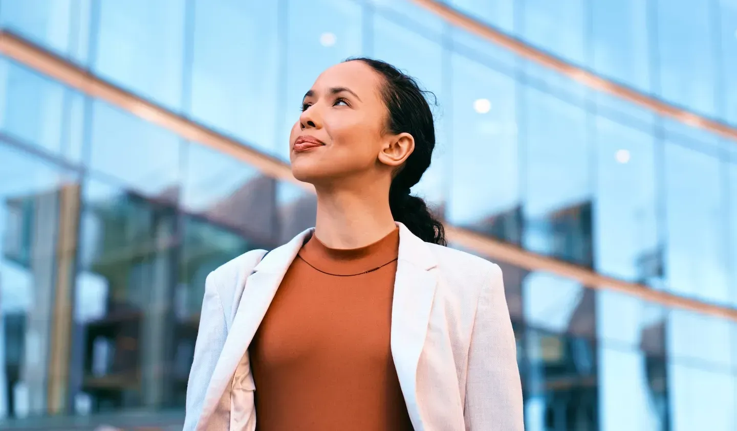 confident business woman looking to the horizon