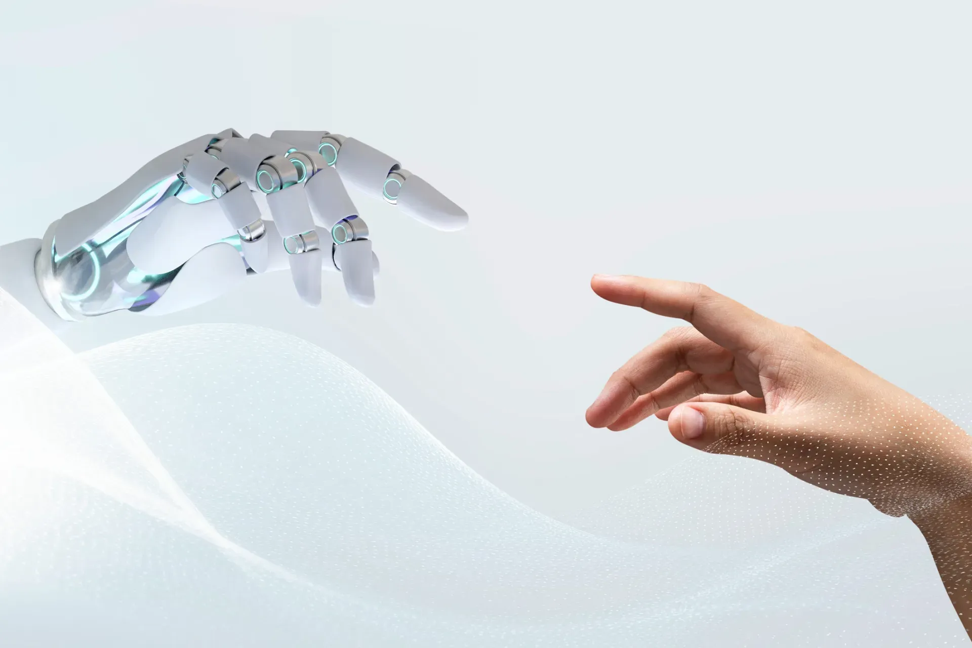 Robotic hand and human hand reaching toward each other, nearly touching, on a light background. Robotic hand and human hand reaching toward each other, nearly touching, on a light background.