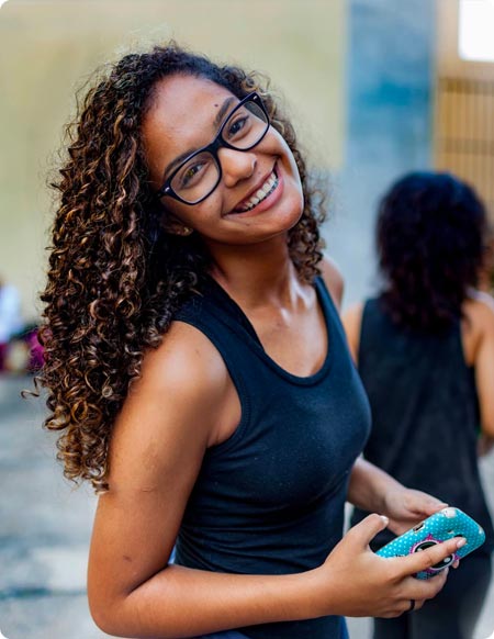 Smiling young woman in glasses
